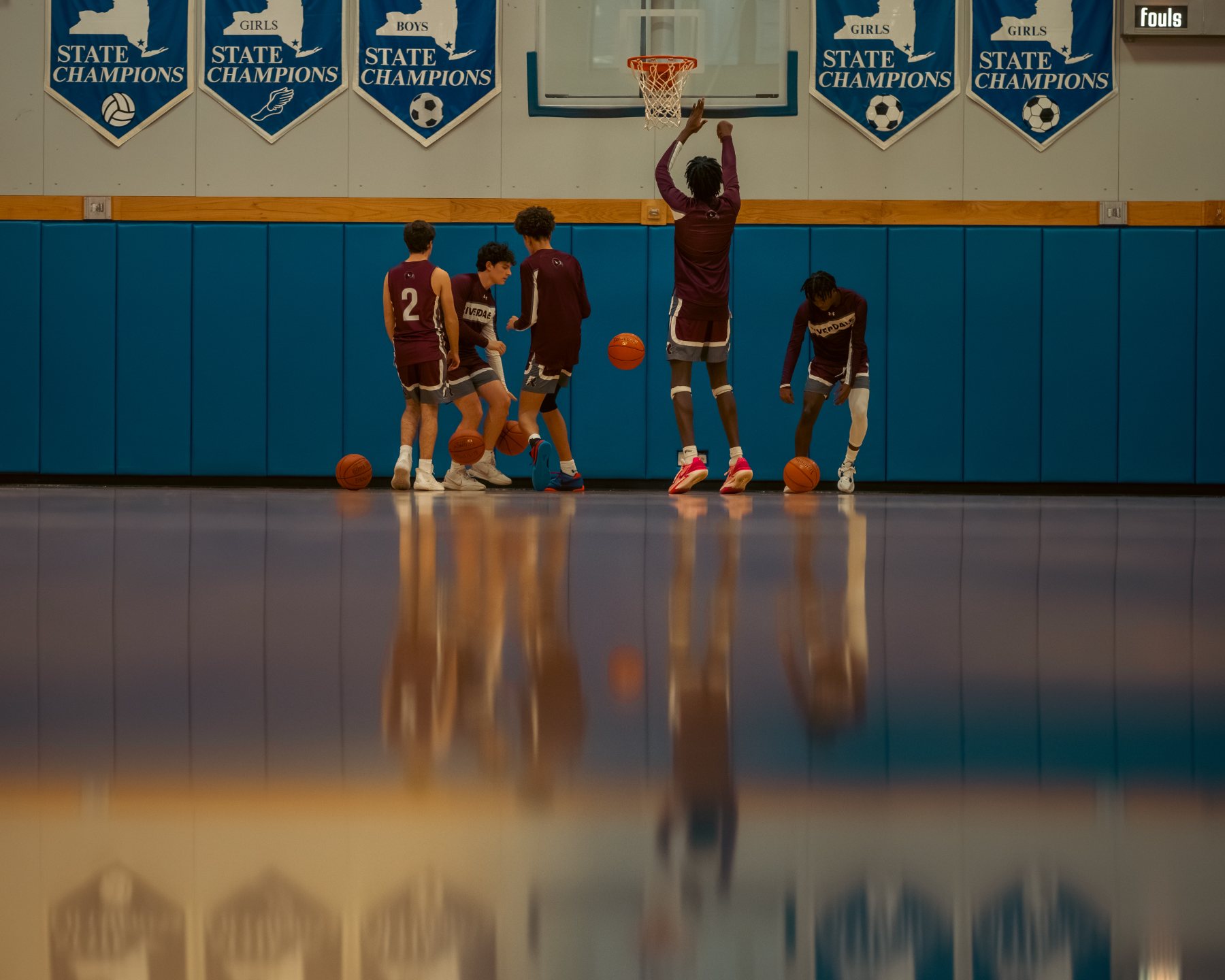 Reflections on the hardwood — state champion banners